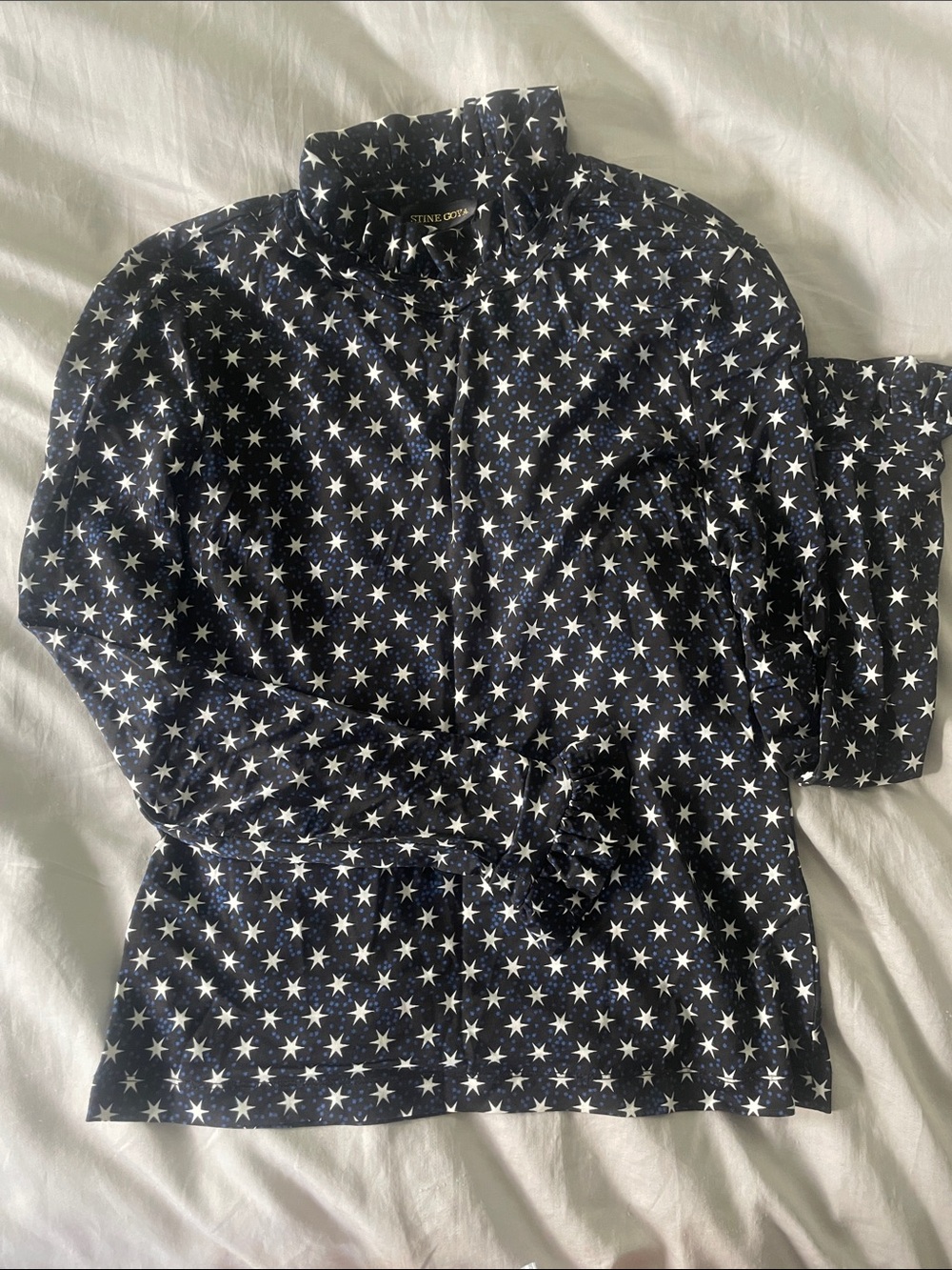 STINE GOYA Black Blouse with White Star Print and Blue Dot Accents